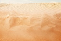 The sand scattering backgrounds outdoors desert.