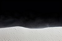 The white sand scattering backgrounds nature black.