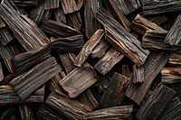 Dark Agarwood thin Chips backgrounds abundance textured.