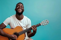 Man holds acoustic guitar and sings musician adult joy.