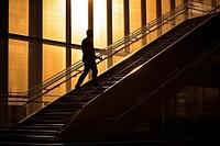Business man silhouette photography architecture backlighting staircase.