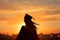 Graduation silhouette photography backlighting outdoors people.