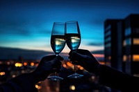Champagne glass silhouette photography outdoors beverage clothing.