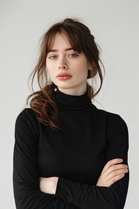 Portrait woman in studio portrait sweater sleeve.