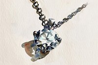 Monochromatic diamond necklace gemstone jewelry pendant.