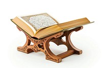 Open Quran books on the stand in the mosque publication furniture table.