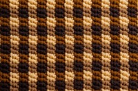 Checkered pattern knitted wool person human rug.