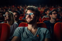 Portrait of handsome man at the movies portrait glasses audience.