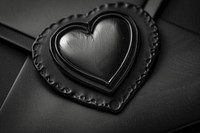 Envelope black heart car.