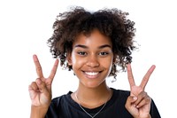 Person making a peace sign finger portrait cheerful.