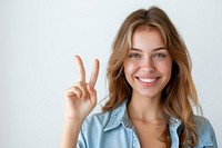 Person making a peace sign portrait finger cheerful.