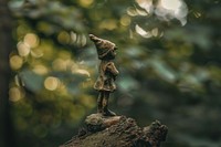 Photo of elf statue representation sculpture wildlife.