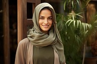 Arab adult woman standing hijab scarf.