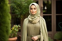 Arab adult woman standing fashion hijab.