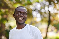 Black man volunteer smiling medication shoulder person.