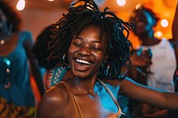 African teenager dancing birthday party night happy laughing person.