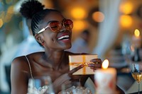Woman African impressed with birthday gift happy text accessories.