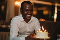 Man African impressed with birthday cake dessert people person.