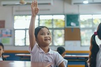 South east Asian girl hand up happy student person.