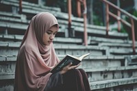 Indonesian girl reading sitting female.
