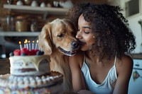 Girl African giving birthday cake dog birthday cake.