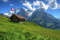 Switzerland flag mountain architecture landscape.