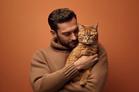 Man hugging cat person photo pet.