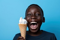 Black kid eating ice cream laughing dessert person.