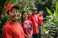 Photo of hispanic volunteer group t-shirt plant accessories.