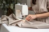 Woman sewing fabric machine appliance device.