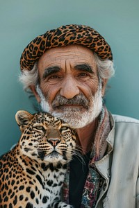 Holding a pet leopard portrait photo photography.
