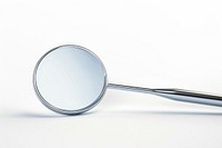 Dental mirror and probe white background reflection magnifying.