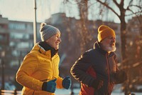 Older man and woman outdoors glove adult.