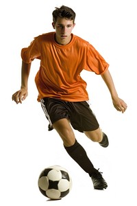 Playing soccer football footwear kicking.