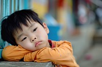 Asian boy looks tired portrait photo disappointment.