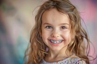Little girl with braces child portrait smiling.