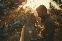 Arabic couple newlywed looking at each other outdoors wedding happy.