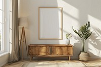 Mockup of a single blank white picture frame on the middle wall sideboard furniture indoors.