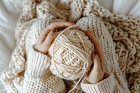 Sweater crochet blanket relaxation.