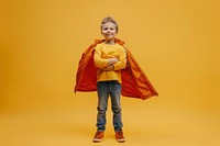 Boy role play hero posing raincoat yellow child.