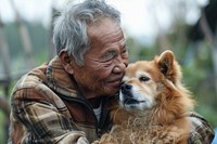 Asian man cuddling a dog photography portrait person.