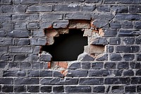 Brick wall window - broken home damage.