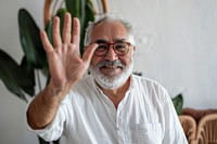 Senior hispanic man waving hand smile accessories accessory.
