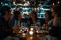 Friends having dinner table furniture outdoors.