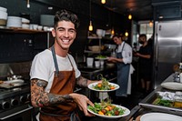 An attractive young chef appliance tattoo plate.