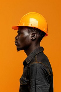 African construction worker side portrait clothing apparel hardhat.