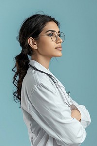 Latinx doctor side portrait clothing apparel female.