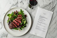 A restaurant menu food document meat.