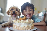 South asian boy and dog happy cake birthday cake.