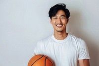 Happy south east asian man basketball happy dimples.